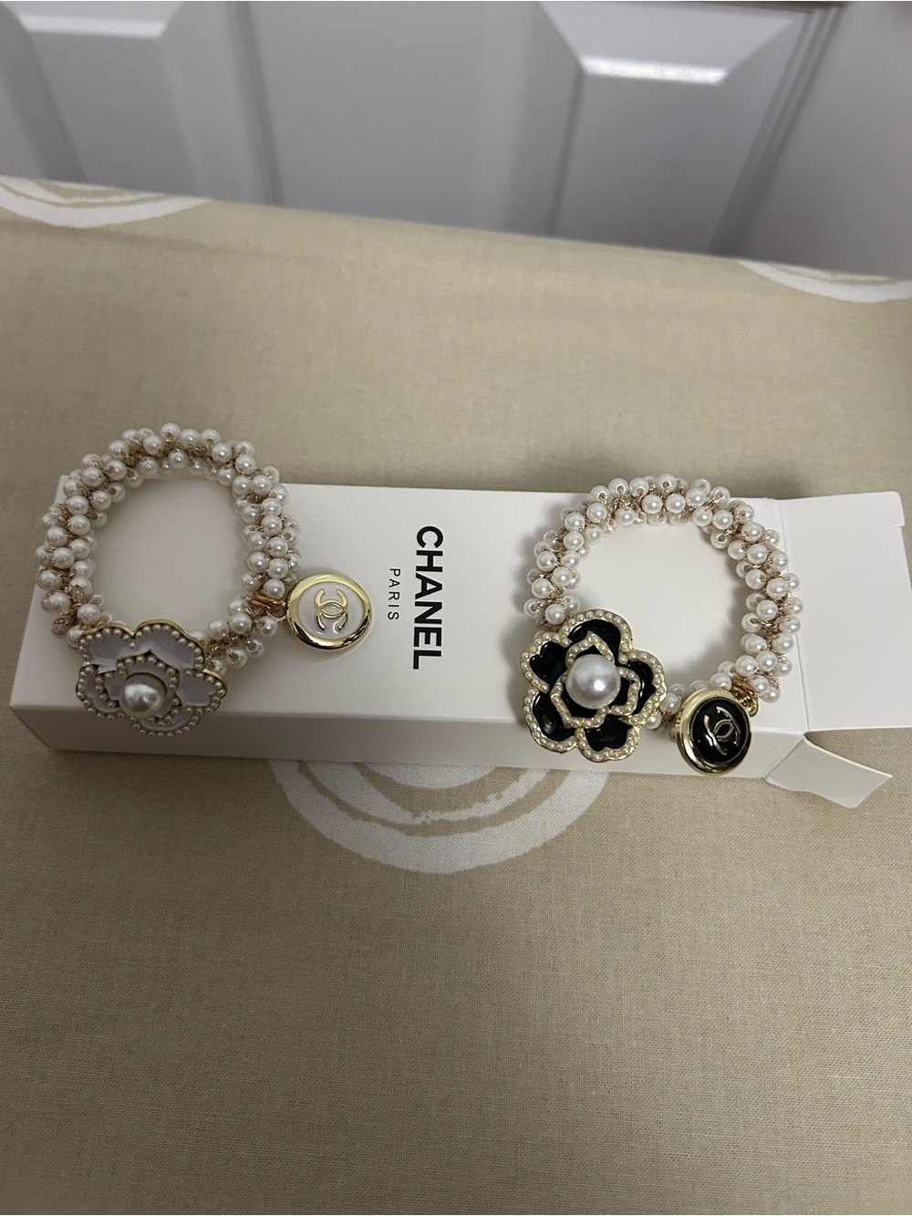 CHANEL Pearl Camellia Charm Bracelets - White, Black & Gold